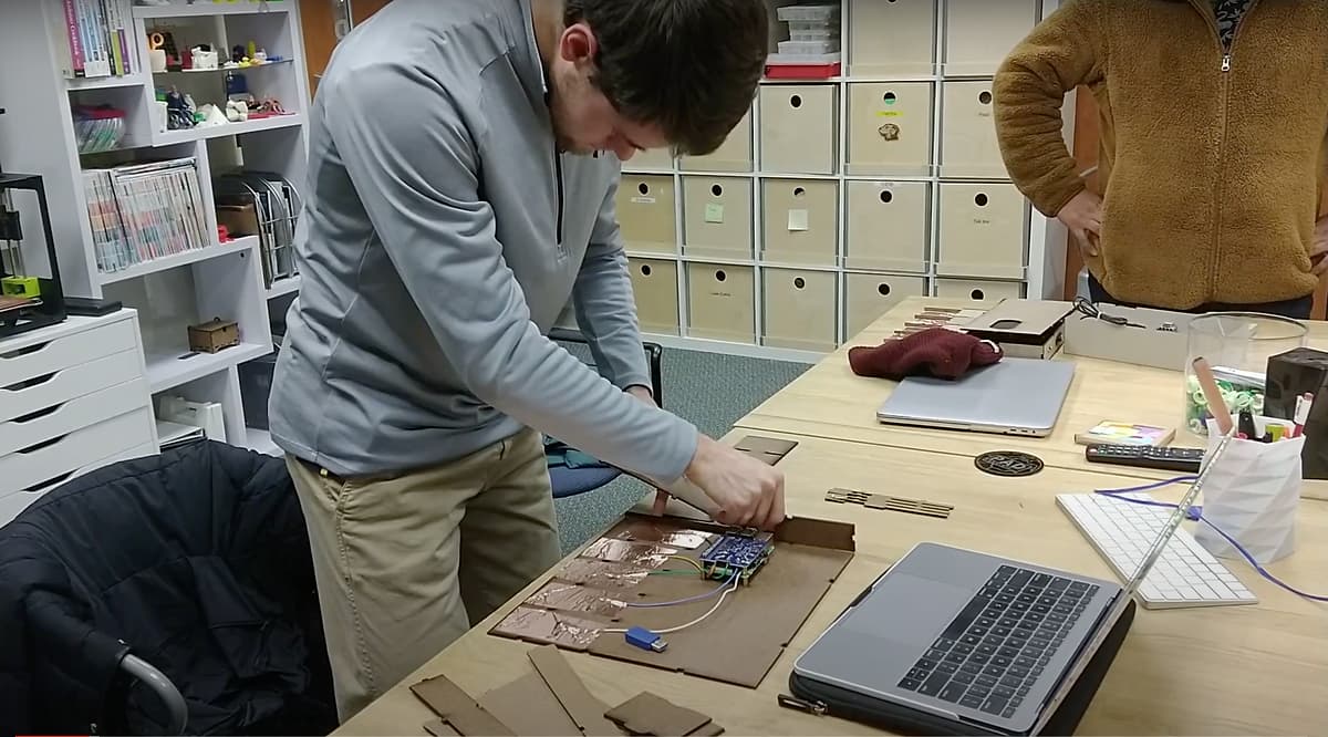 A student assembling the talkbox