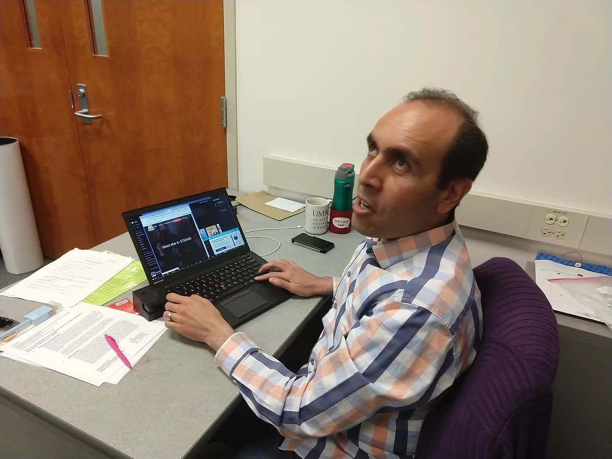 My friend, Ali, who is blind, testing the screen reader accessibility of the website.